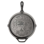 Cast iron skillet with the bottom engraved with beloved icons and monuments from Pennsylvania.