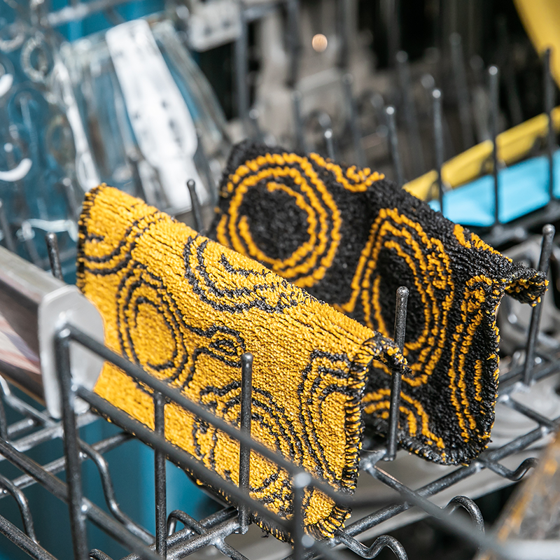 Scrub cloth's in dishwasher.