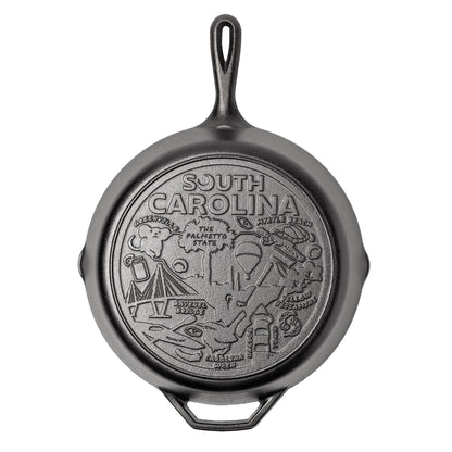 Cast iron skillet with the bottom engraved with beloved icons and monuments from South Carolina.