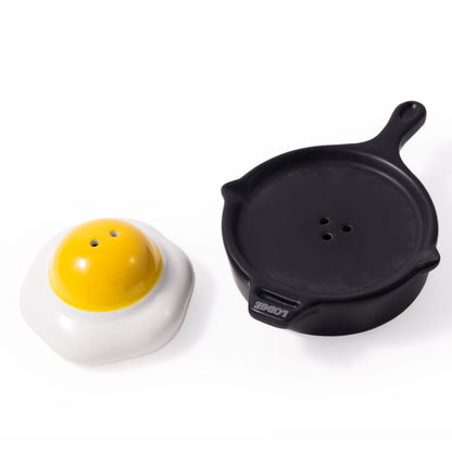 Two novelty items shaped like a fried egg with a yellow yolk and a frying pan on a white background.