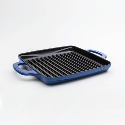 Enameled, square grill pan with a blue exterior and a black cooking surface.