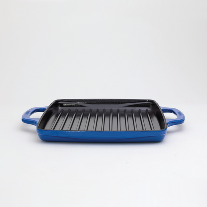 Enameled, square grill pan with a blue exterior and a black cooking surface.