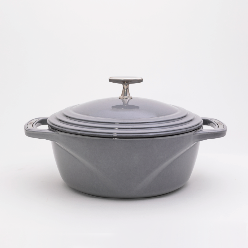 Grey enameled cast iron Dutch oven with a lid on a white background