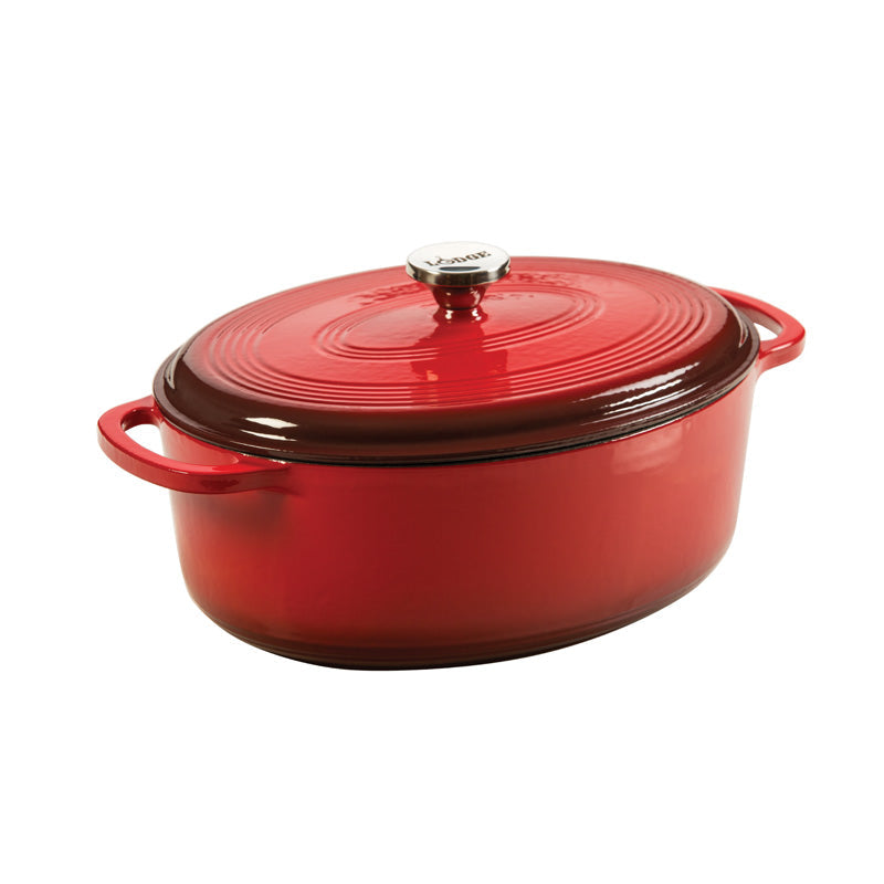 Red oval enameled cast iron cookware with lid on a white background