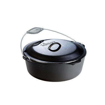 Black cast iron Dutch oven with lid and a silver handle.