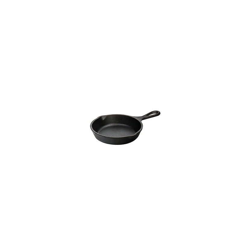 Cast iron skillet with one long handle, there's a pour spout on the left and right side.