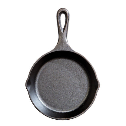 Cast iron skillet with one long handle, there's a pour spout on the left and right side.