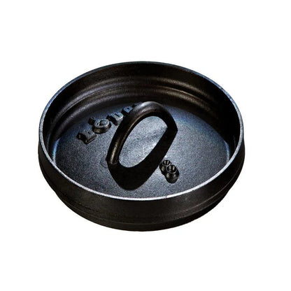 Black lid with a handle on a white background