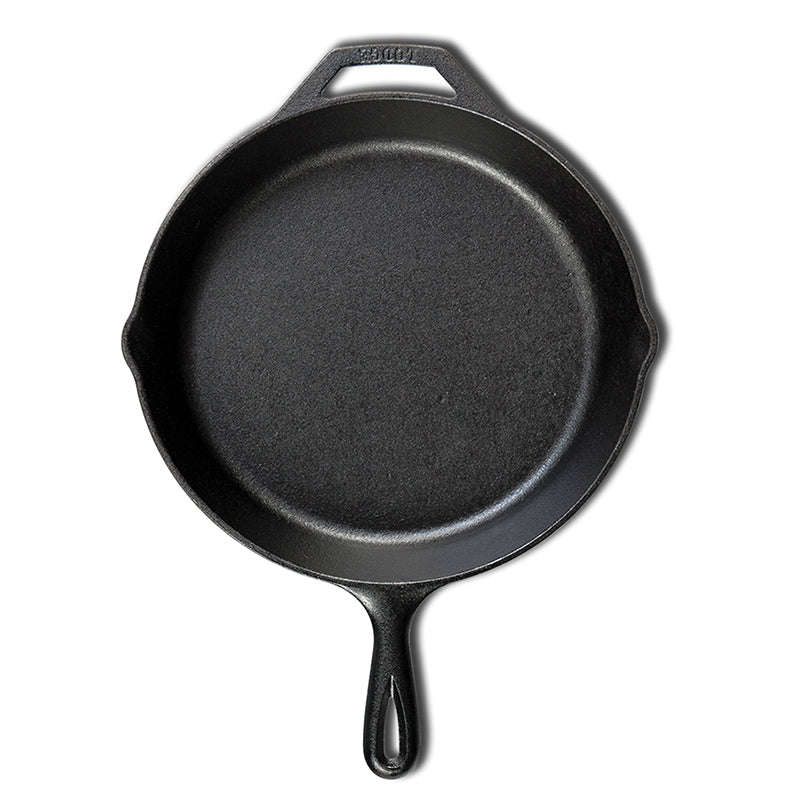 Cast iron skillet with one long handle and one assist handle on opposite side, there's a pour spout on the left and right side.
