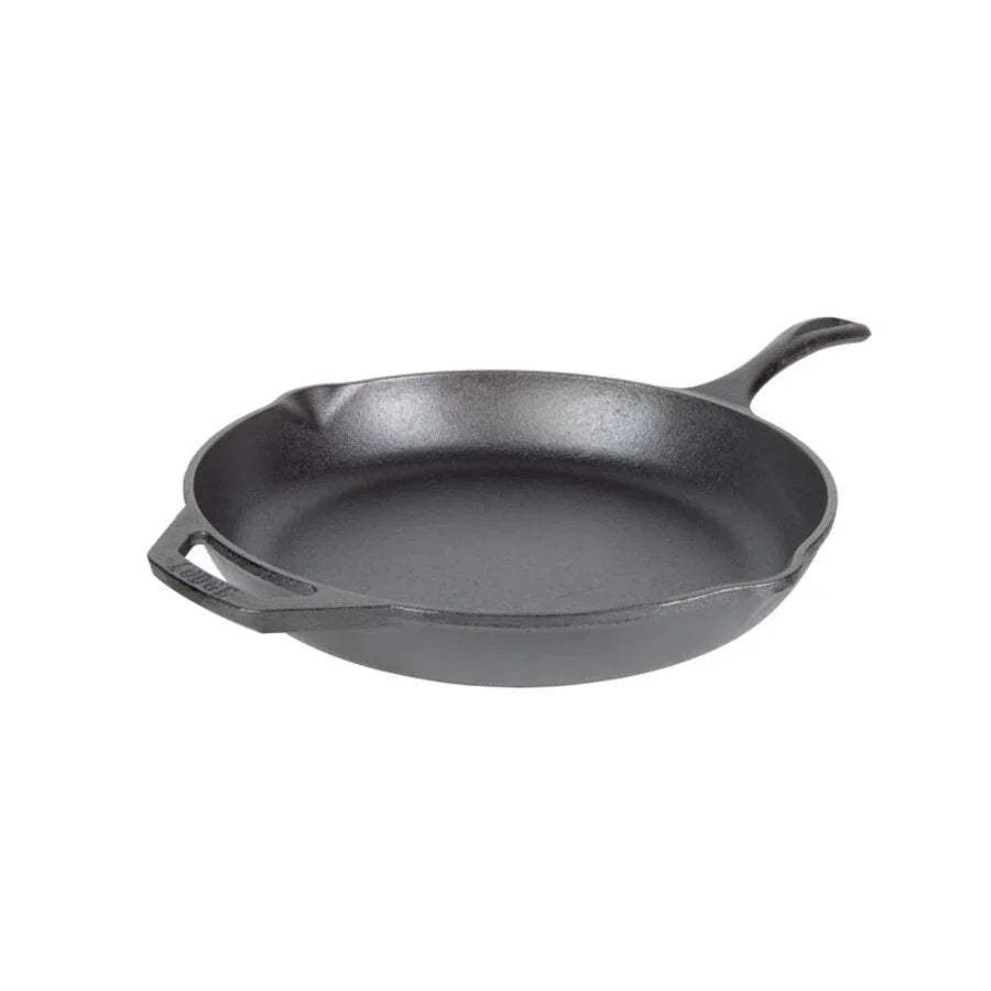Black cast iron skillet with long handle and loop handle on opposite sides, along with 2 pour spots.