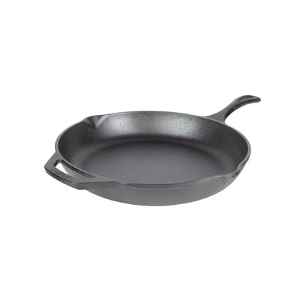 Black cast iron skillet with long handle and loop handle on opposite sides, along with 2 pour spots.
